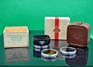 Rollei Lens Hood and 2 Filters  - BOXED - With Leather Case - Picture 1 of 3