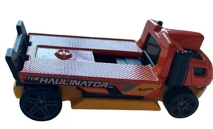 Hot Wheels "The Haulinator" Die-Cast Toy Truck orange & gelb Mattel Maßstab 1:64 - Bild 1 von 6