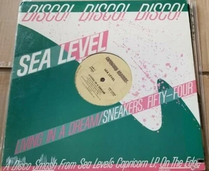 Meeresspiegel, Turnschuhe (vierundfünfzig) mit Etikett Leben in einem Traum; 12" LP in Schrumpf - Bild 1 von 3