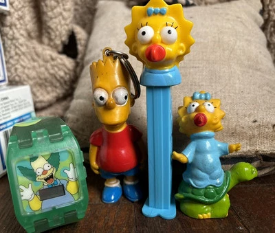 Lote Simpsons - Figura, Dispensador Pez, Llavero, Reloj Krusty - DE COLECCIÓN Foto 1 de 4