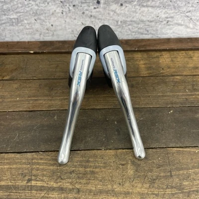 De colección Shimano RSX BL-A410 Bicicleta de Carretera Palancas de Freno Nuevo de Lote Antiguo Barra de Caída Capucha Foto 1 de 4