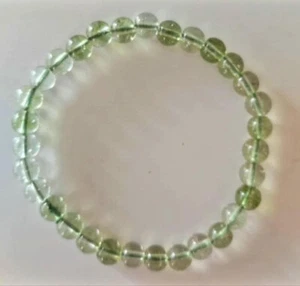 PERIDOT NATURAL GEMSTONE-CRYSTAL 6 MM BEAD STRETCH BRACELET-FREE POSTAGE - Picture 1 of 4