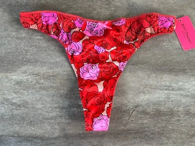 Tanga de satén sedoso vintage Betsey Johnson rosa M nuevo Foto 1 de 4