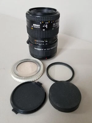 Lente Nikon AF Nikkor 35-70 mm 1:3,3-4,5 + Tamron-F 2X tapas de filtros convertidores. Leer Foto 1 de 4