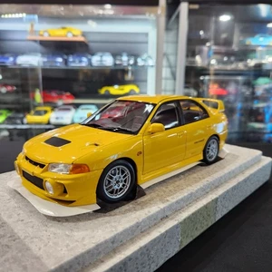 Motorhelix 1/18 Mitsubishi Lancer Evolution IV (Yellow) Opening Diecast Model - Picture 1 of 6