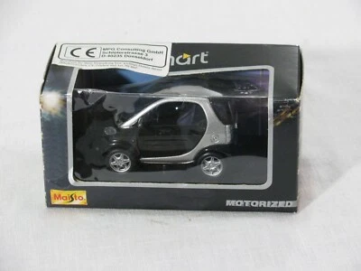 NIOB Maisto 1:33 Diecast/Plastic Motorized Pull Back Smart Car, Black/Silver - Image 1 of 4