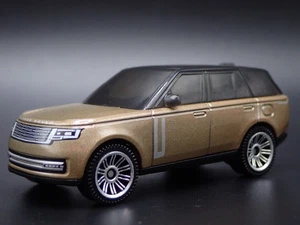 2022-2025 RANGE ROVER PHEV GOLD 1/64 SCALE COLLECTIBLE DIORAMA DIECAST MODEL CAR - Picture 1 of 8