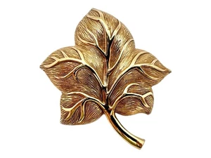 Broche de bisutería Christian Dior chapado en oro joyería vintage - Imagen 1 de 5