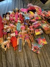 Énorme lot de Barbies et accessoires et vêtements des années 90