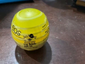 NEU JACK DANIELS Tennessee Honey EOS LIPPENBALSAM LSF15 ZITRONENTROPFEN - Bild 1 von 3