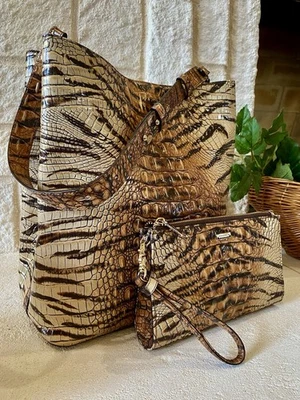 It’s the LARGE AMELIA TOTE and DAISY WRISTLET by Brahmin in FELINE OMBRE - Image 1 of 4