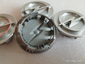 4x Centre De Roue Opel Corsa Cache Moyeu Centraux Opel 59mm D'origine 467597050 - Picture 1 of 3