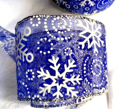 White Snowflake on Blue Sheer 2.5" by 5 yds Wired Ribbon Christmas Winter - Image 1 of 4
