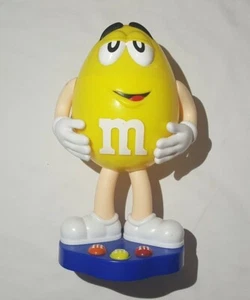 YELLOW M & M CANDY DISPENSER PRE OWNED 13" GOOD CONDITION - Picture 1 of 4