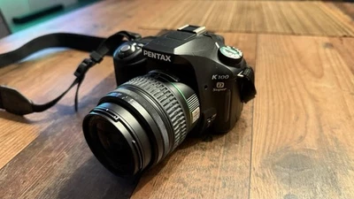 Pentax K K100D Super 6.1MP Digitalkamera - Schwarz (Kit mit AL 18-55mm Objektiv) - Bild 1 von 4