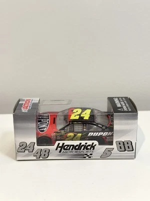Jeff Gordon #24 DuPont 2010 escala 1/64 CUNA NASCAR diecast acción serie dorada NUEVO Foto 1 de 3