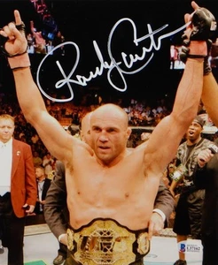 Randy Couture Autographed UFC 8x10 Photo With Belt- Beckett Auth *White - Picture 1 of 5