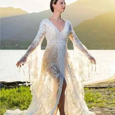 Boho Mermaid A-LIne Wedding Dress with Long Bell Sleeves V Neck and Beading - Image 1 of 4
