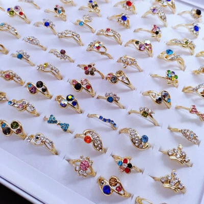 50 piezas al por mayor mezclados coloridos anillos para mujer flor cristal estrás anillo para dedos Foto 1 de 4
