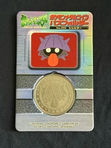 1998 Pokemon Meiji 090 Shelder Lottery Medal with Backing Rare Prize Coin - Picture 1 of 2