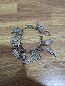 Vintage Silver Plated Charm Bracelet W/ 11 Charms, Ships, Car, Globe Etc - Picture 1 of 5