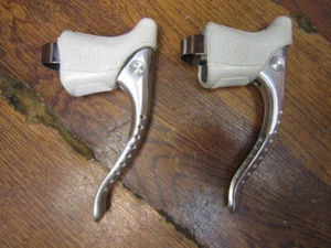 NOS VINTAGE CAMPAGNOLO SUPER RECORD DRILLIUM BRAKE LEVERS - WHITE HOODS - Picture 1 of 8