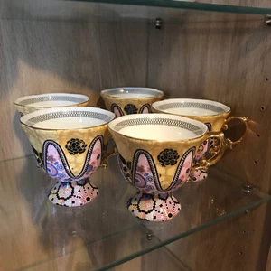 T2 set of 5 cups yellow pink ornate LIKE NEW - Picture 1 of 6
