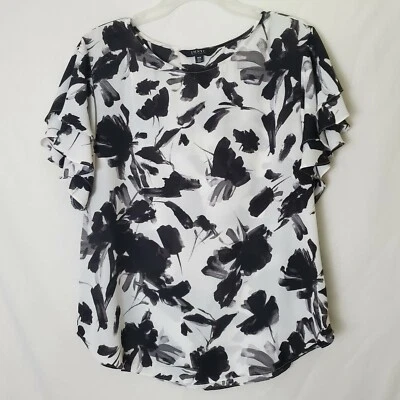 Blusa IMNYC Isaac Mizrahi para mujer talla M negra blanca estampada manga con volantes  Foto 1 de 4