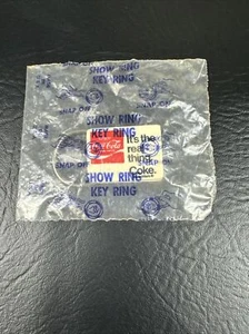 1970s Coke It's The Real Thing Coca-Cola Plastic Key Chain Promo New Sealed Bag - Picture 1 of 5