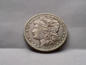 1886-0 MORGAN SILVER DOLLAR - Picture 1 of 10