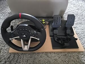 Ps4 steering wheel and pedals by Hori, suitable for PC too, Wired. 