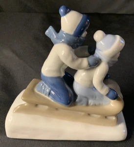 Porcelana de Cuernavaca Mexico Figurine Boy Girl Blue White Children on Sled - Picture 1 of 8