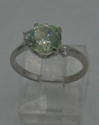 ANILLO ORO BLANCO 10K TALLA 7,5 CON PIEDRA VERDE CLARO Y 2 CZS 2,3 GRAMOS Foto 1 de 4