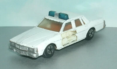 Coche de policía Pontiac Bonneville Dukes of Hazard Sheriff 1980 escala 1/64 - Ertl Foto 1 de 4