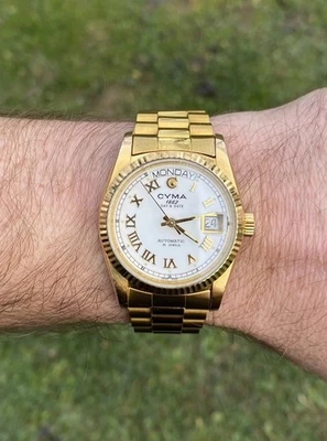 Oro Cyma 1862 Día y Fecha Automático Suizo con Pulsera Estilo Presidencial. ¡Bonito! Foto 1 de 4