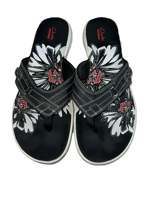 Sandalias acolchadas Clarks para mujer Breeze Sea suela de goma Eva negras/blancas 12M Foto 1 de 4