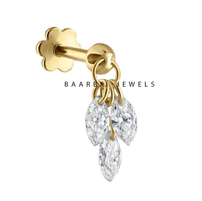 Pluma de diamante flotante de tres diamantes perforada marquesa de oro macizo de 14 quilates Foto 1 de 4