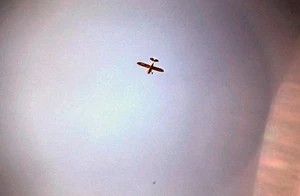 Original Slide, 1954 - Mail Plane flying above Wales, Alaska - Picture 1 of 1