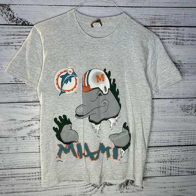 Camiseta mediana vintage años 90 Nutmeg Mills Miami Dolphins doble cara innovadora Foto 1 de 4