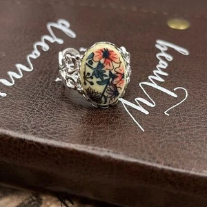 Vintage 70er Jahre rosa Blumenstrauß ovaler Cabochon Edelstahl Ring mit offener Rückseite - Bild 1 von 12