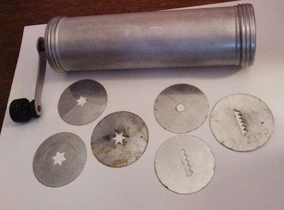 Pistola de galletas prensa galletas de aluminio vintage con 6 discos años 50 Foto 1 de 4