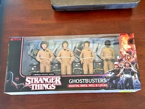 McFarlane Stranger Things Ghostbusters 4er Pack Actionfiguren Dustin Will Mike - Bild 1 von 3