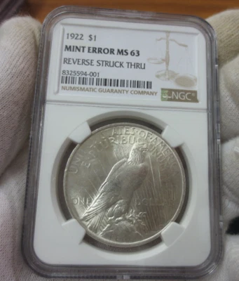 1922 Peace Dollar MINT ERROR Reverse Struck Thru NGC MS63 - Image 1 of 4