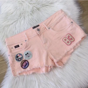 Superdry Denim Shorts Womens W26 Peach Pink Low Rise Frayed Hot Pants Badges - Picture 1 of 12