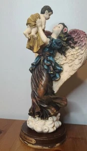  UniqueCollection rare Vintage Angel guardian lifting a child Figurine  - Picture 1 of 8