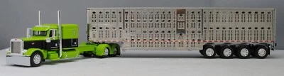 DCP 1/64 Lime Green Black Peterbilt 389 Wilson Quad Livestock Trailer 60-1311 - Image 1 of 4