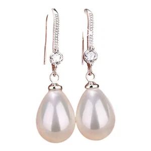 Boutique Delicati Orecchini Donna Invernali Bianchi Ovali Perle E Argento 4️⃣ - Foto 1 di 3