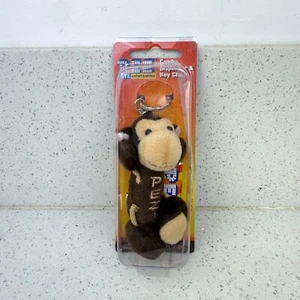 Llavero y dispensador de felpa PEZ Safari Babies Monkey - 2005 retirado sin usar, en caja - Imagen 1 de 4