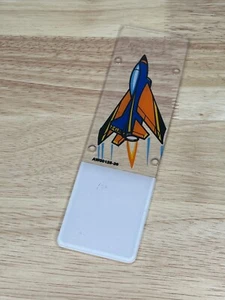 Capcom corsia tiro aviotrasportato in plastica / portachiavi. PROMO Flipper Ricambi x - Foto 1 di 5