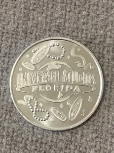 Universal Studios Mardi Gras Coin Aluminium Collectable - Picture 1 of 2